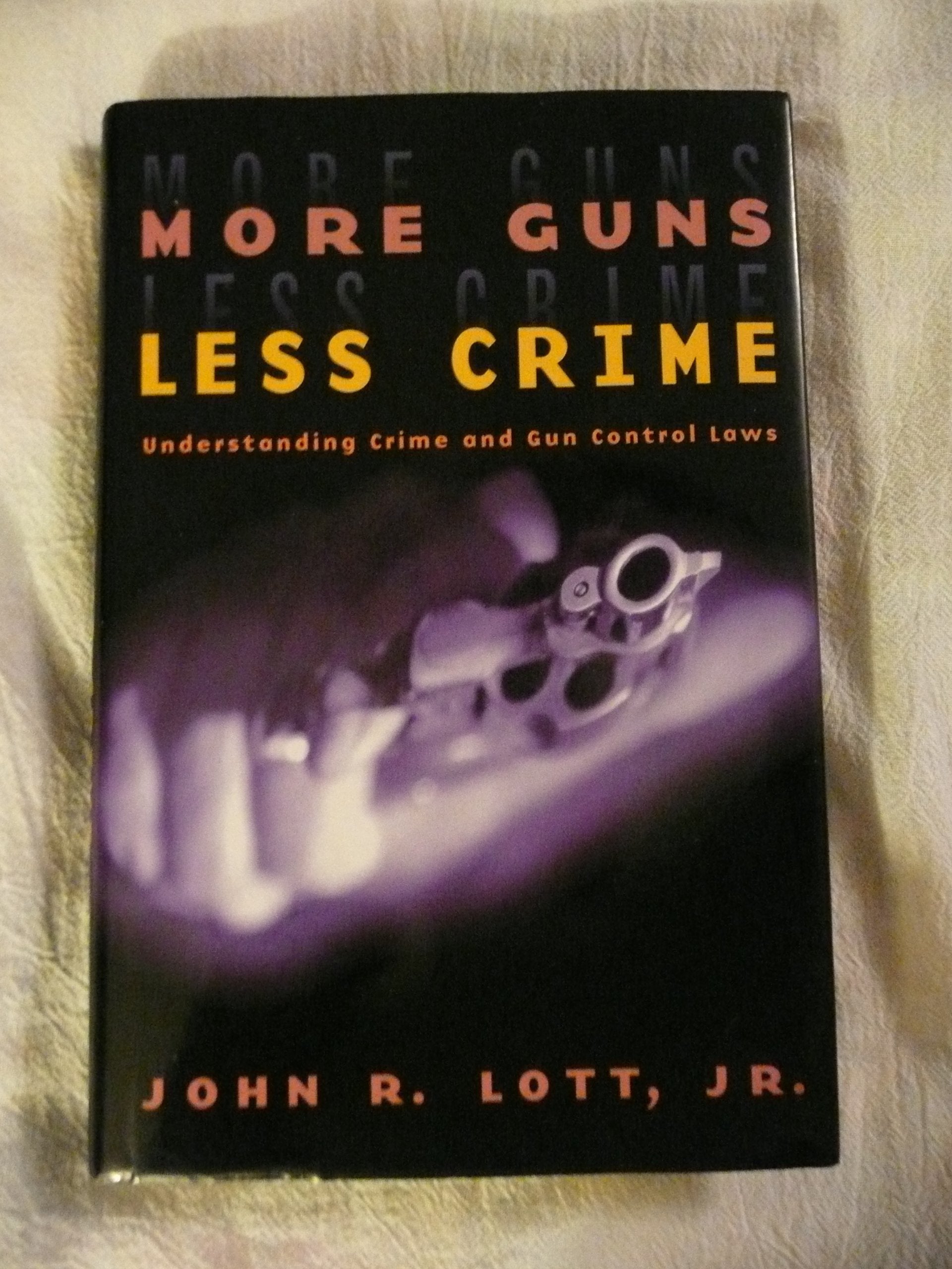 More Guns, Less Crime: Understanding Crime and Gun Control Laws (Studies in Law and Economics)